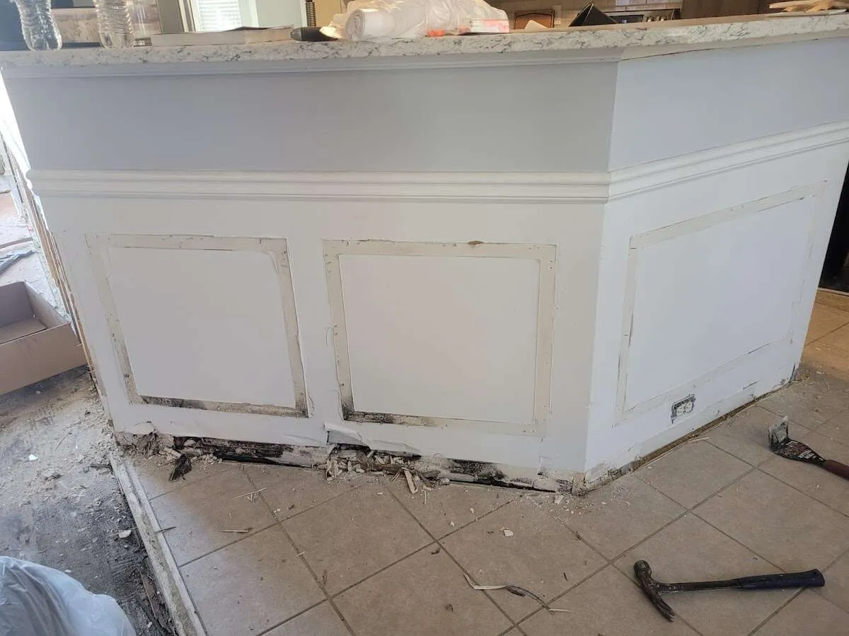 Water damage and mold on kitchen during Storm Damage Restoration in Montebello